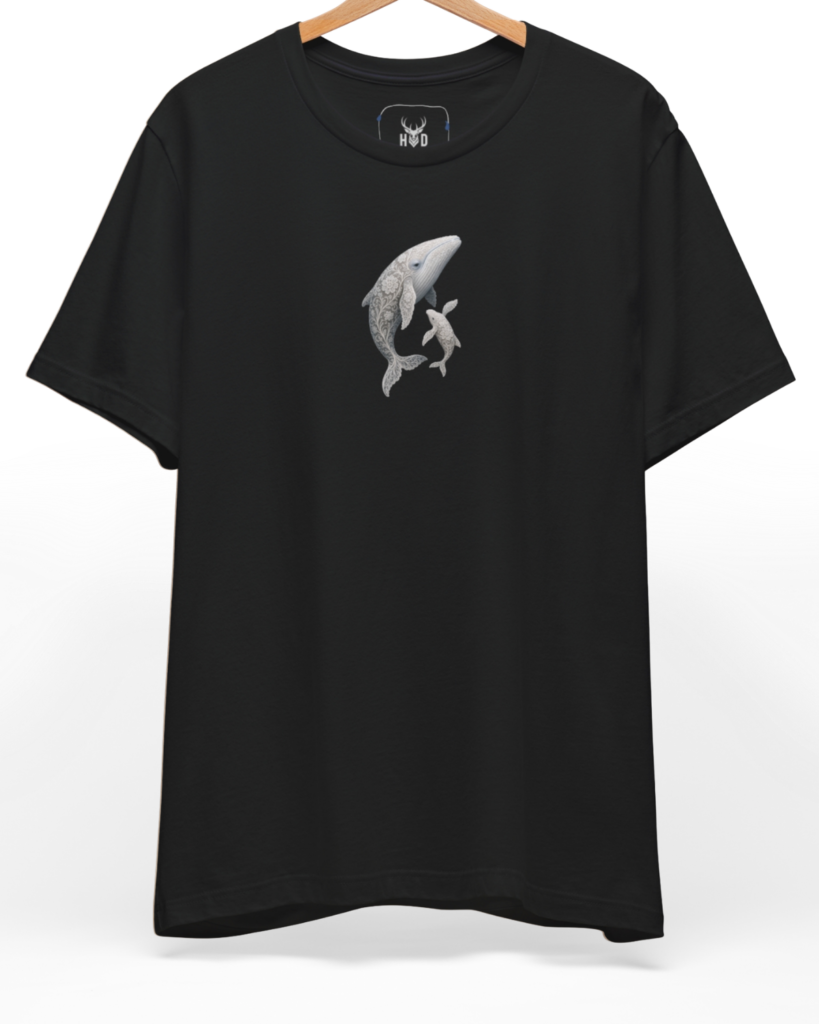 An eye-level studio presentation highlighting the ocean-life-shirt-design-modern-aesthetic-sea-art-by-holydeer-exclusive-marine-drop.jpg artwork aligned on the upper left chest of a premium combed black cotton canvas by Holydeer Clothing.