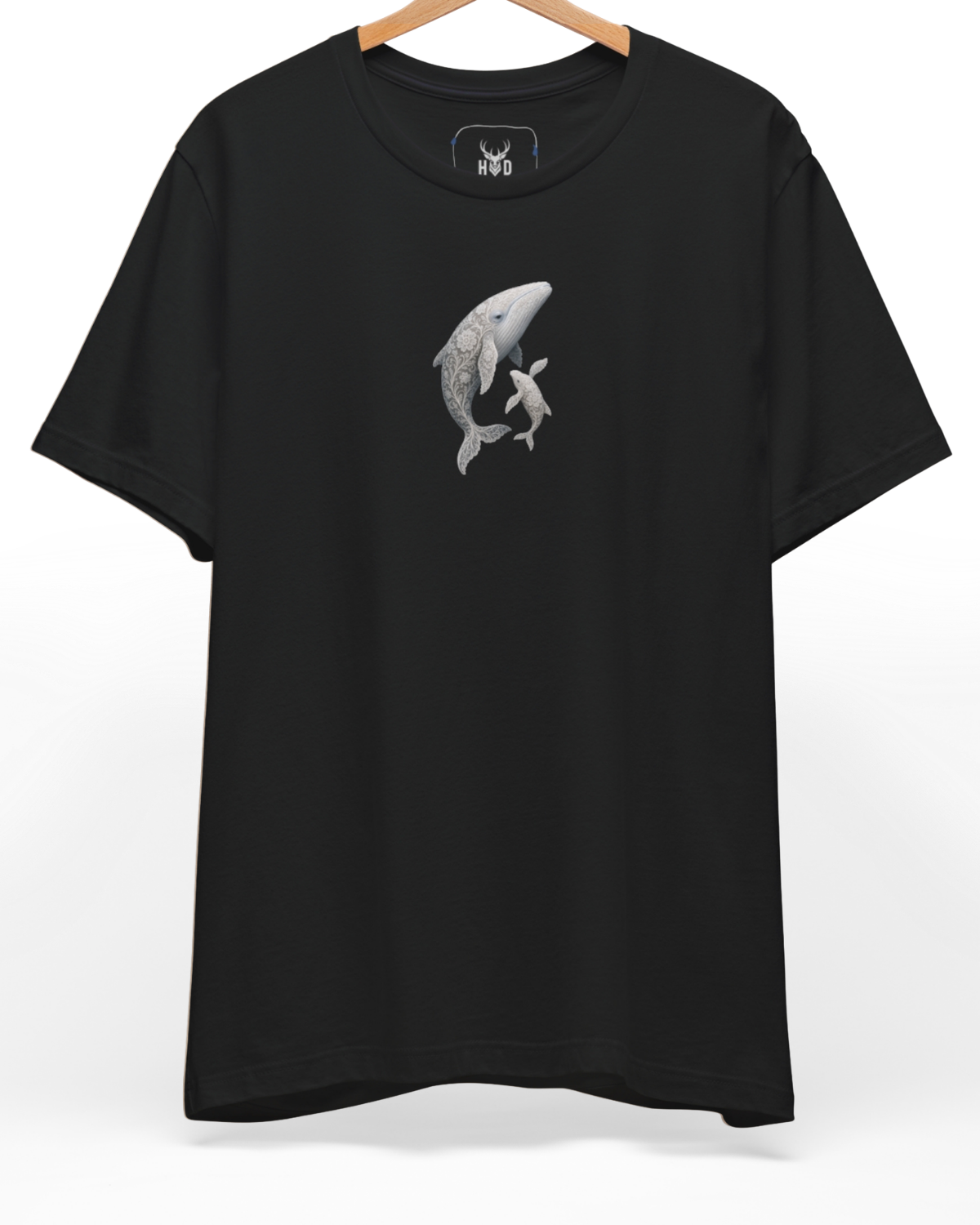 An eye-level studio presentation highlighting the ocean-life-shirt-design-modern-aesthetic-sea-art-by-holydeer-exclusive-marine-drop.jpg artwork aligned on the upper left chest of a premium combed black cotton canvas by Holydeer Clothing.