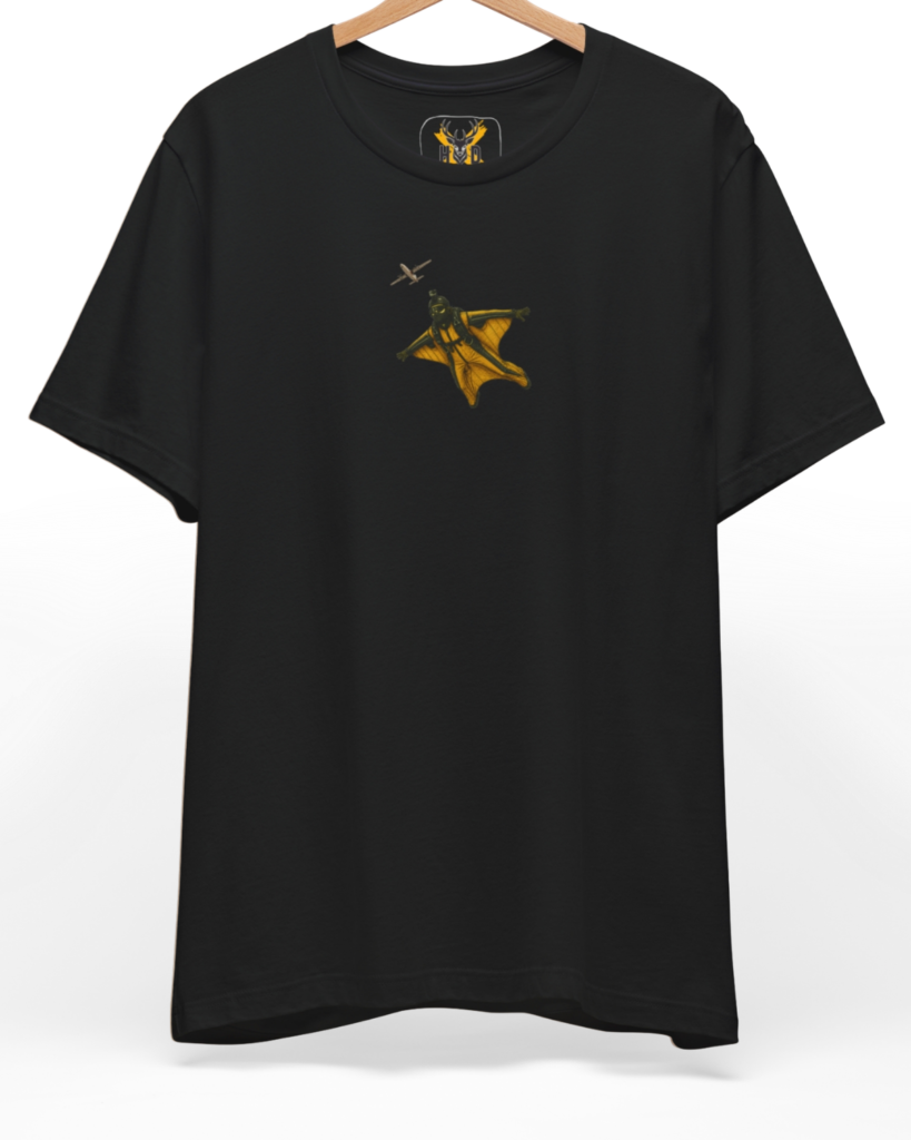 Premium Wingsuit Pilot Tee displaying a high-detail minimalist illustration with a yellow wingsuit flying art concept on a deep teal folded shirt layout, designed by Holydeer Clothing.