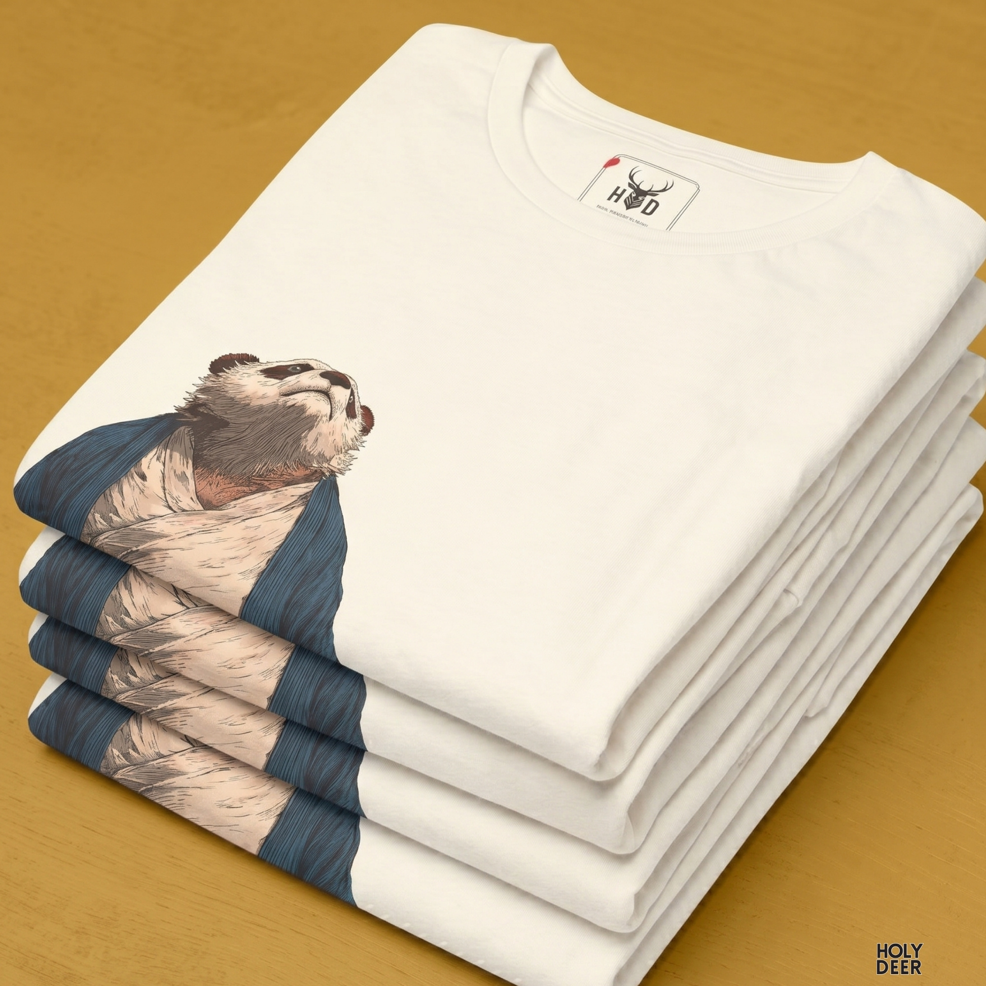 Professional flat lay photography of the kawaii panda tee by Holydeer Apparel, arranged elegantly next to traditional japanese panda tee prints and high-end cultural tshirt accessories.