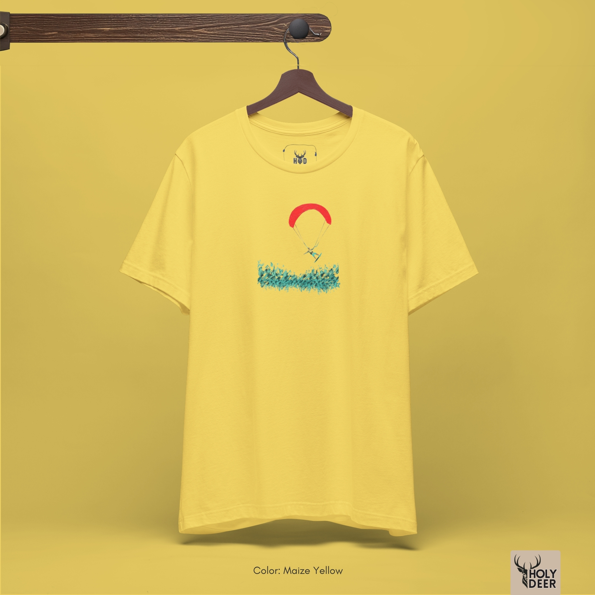 Commercial studio catalog frame of the independent windseeker t-shirt piece hanging elegantly under focused spot lights to capture accurate fabric drape.