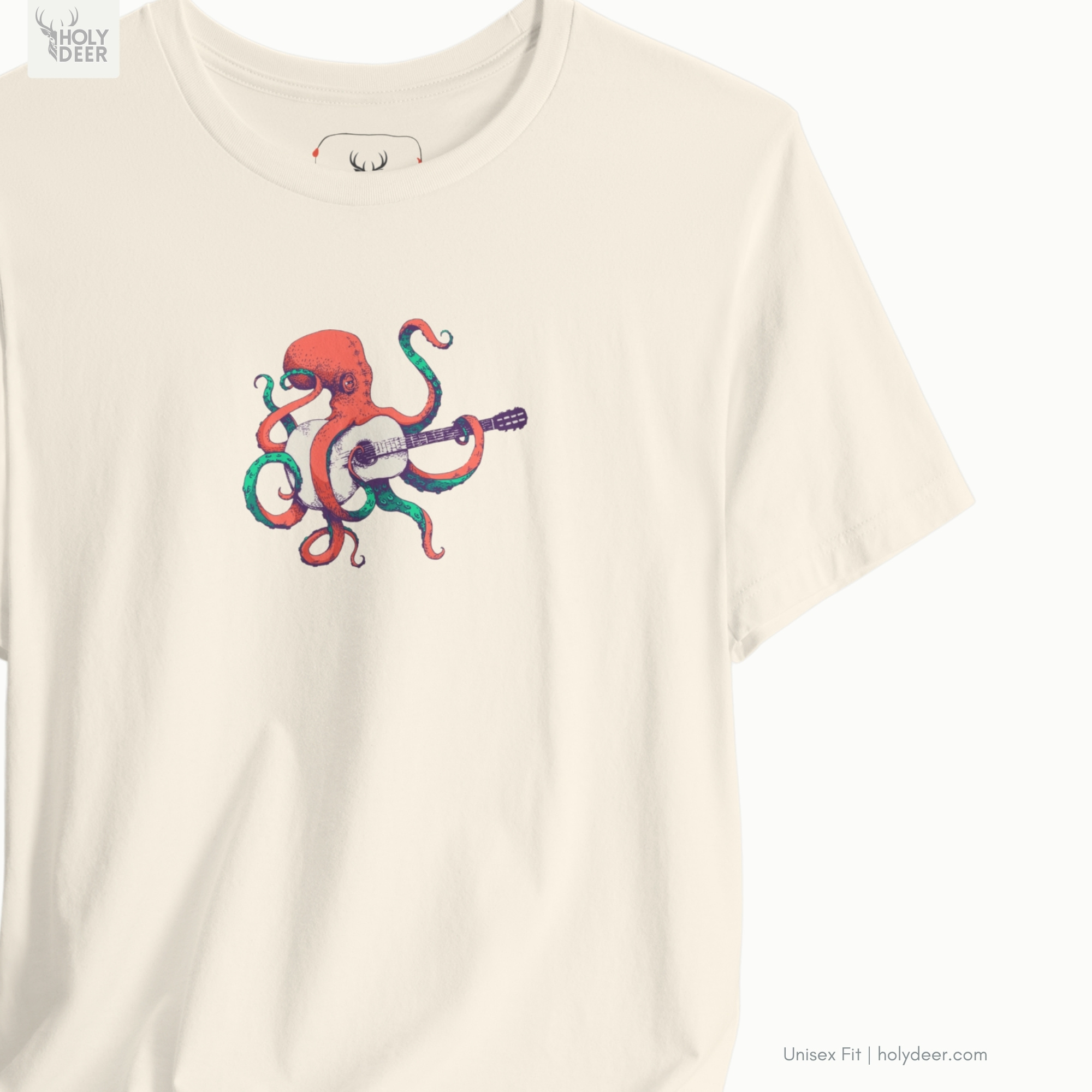 Soft marine shadow studio backdrop framing the unique Indie Musician Tee by Holydeer Streetwear, magnifying the clean centered octopus guitarist placement and premium unique surreal music top presentation.