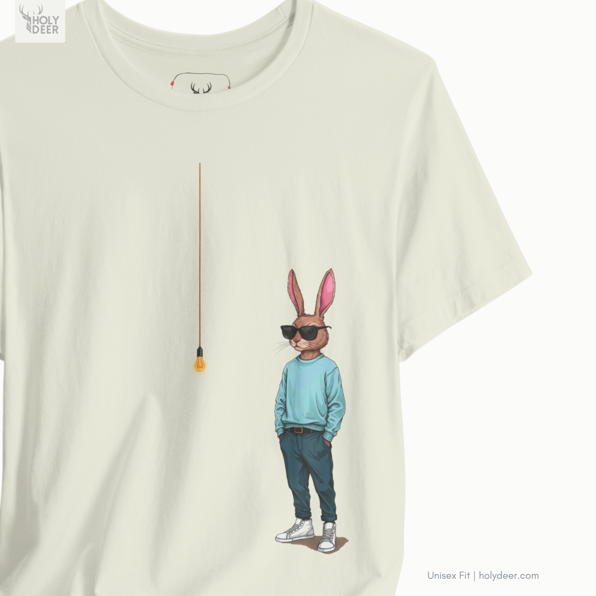 Professional flat lay photography of the Cool Rabbit Shirt by Holydeer Apparel, arranged elegantly next to minimalist architecture sketchbooks, matte black fountain pens, and premium creative mind wear items.