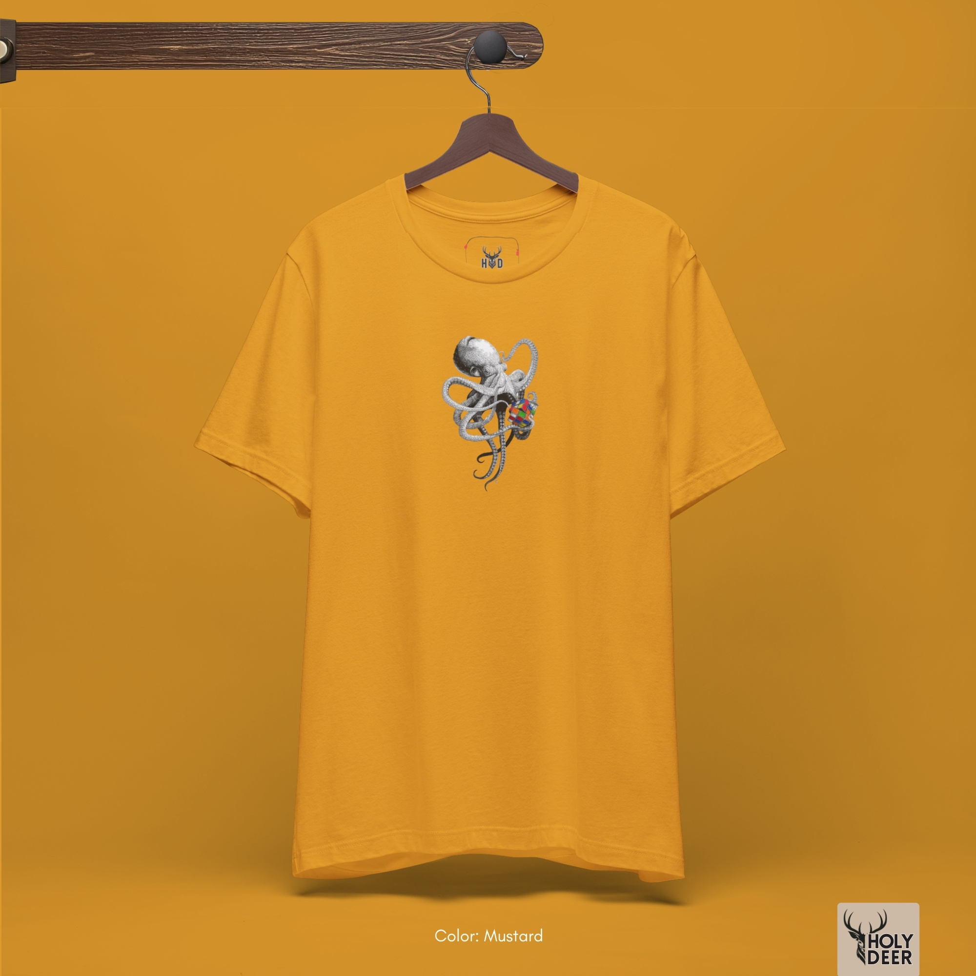 Soft dramatic shadow studio ray backdrop framing the unique Smart Octopus Shirt by Holydeer Streetwear, magnifying the clean centered surreal intelligence placement and premium deep teal top presentation.