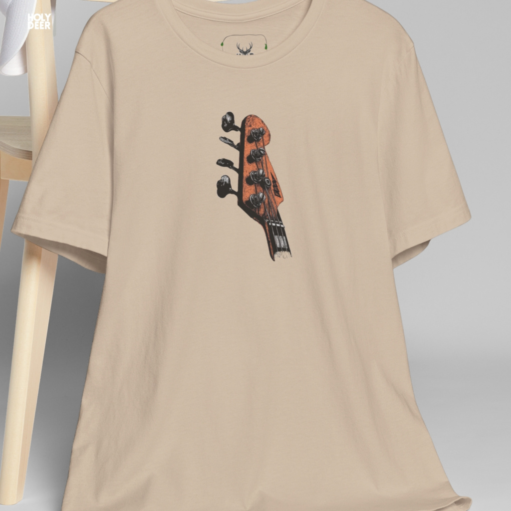 Urban model styling the oversized Bass Guitar Tee from Holydeer Clothing, standing as a high-end musician gift shirt alternative matching the finest modern classic rock wear aesthetics.