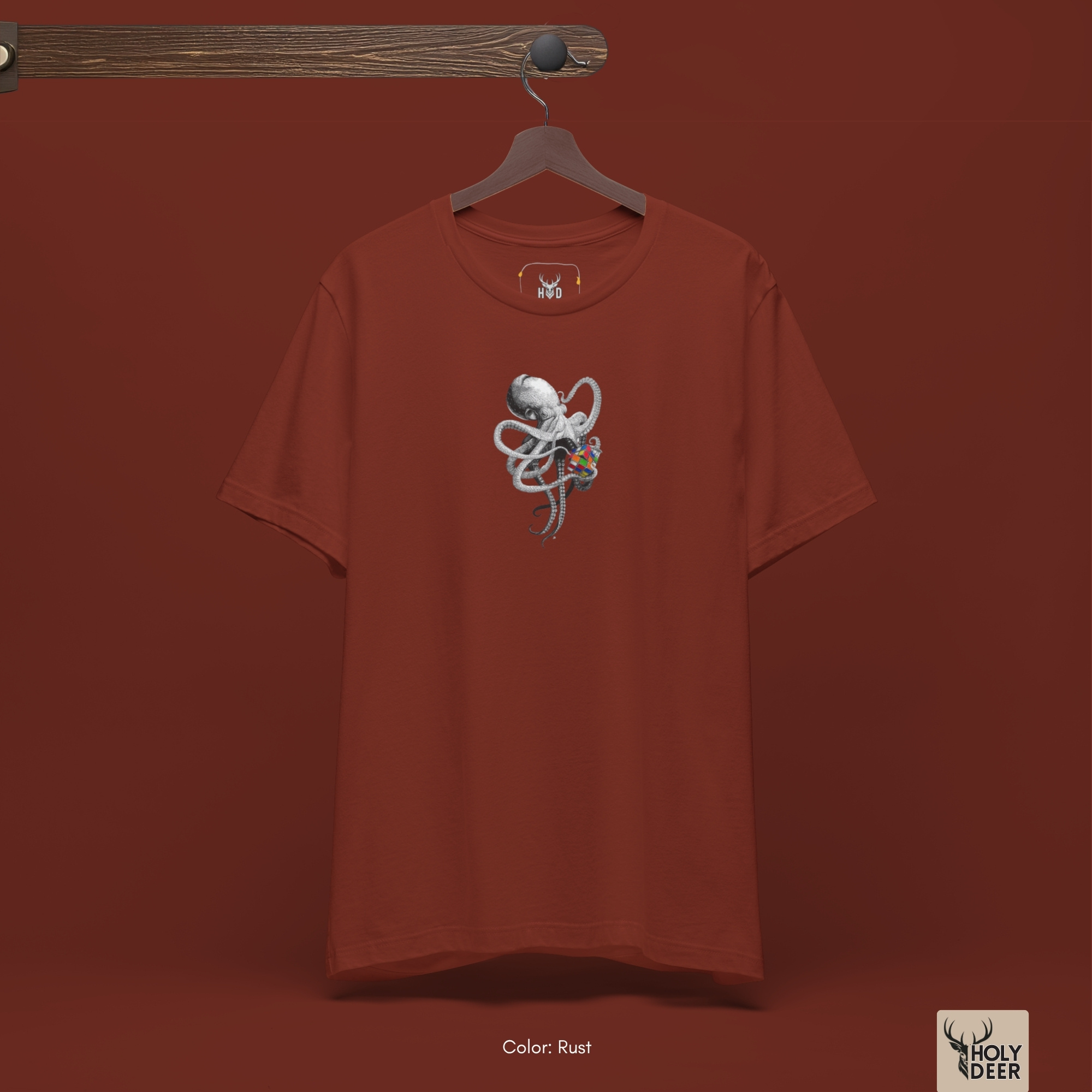 Minimalist dark backdrop focusing heavily on the standalone frame of the Smart Octopus Shirt by Holydeer, proving it acts as a unique wearable art piece and an essential octopus rubiks cube collectible.