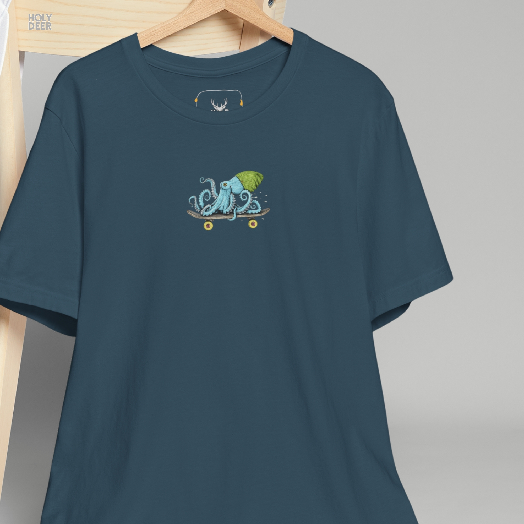 Angled perspective of the premium screen-printed Skater Octopus shirt, detailing the thick paint feel, skateboard shirt alignment, and the signature holydeer tee high-contrast cute octopus art look.