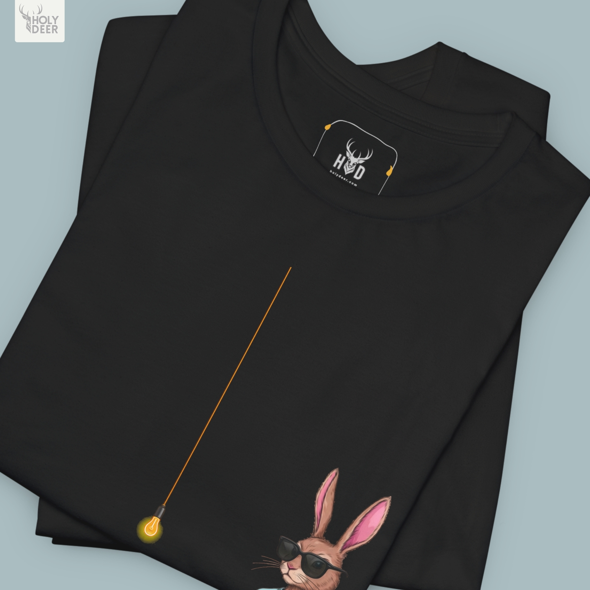 The iconic Cool Rabbit Shirt hanging cleanly on a luxury wood hanger, highlighting the robust neckline structure, crisp asymmetric layout flow, and the official holydeer.com retail tags.