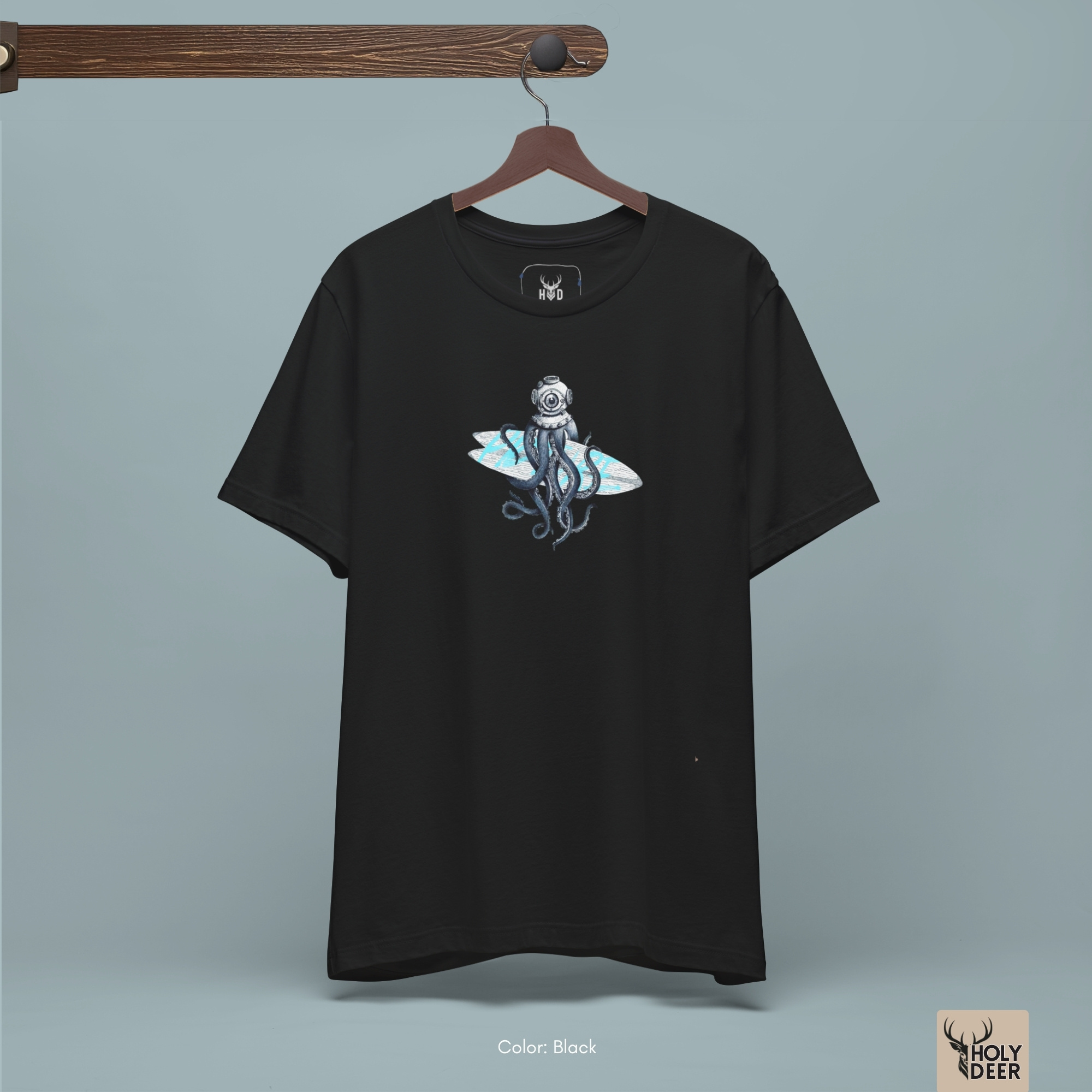 Dark shadow studio backdrop framing the unique Diver Octopus Shirt by Holydeer Streetwear, magnifying the clean centered graphic placement and premium surf lover shirt presentation.