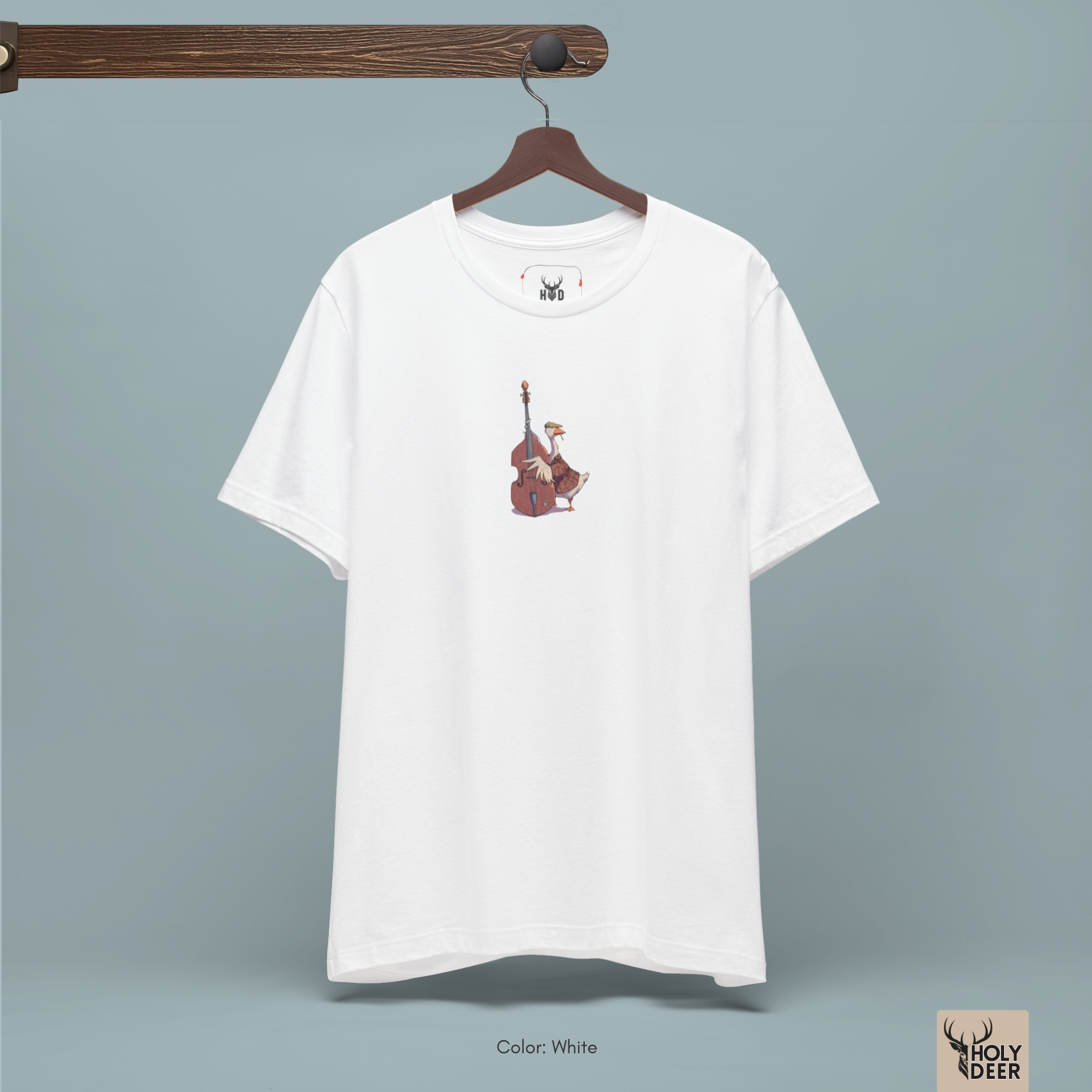 Minimalist deep teal backdrop focusing heavily on the standalone frame of the Musician Goose Top by Holydeer, proving it acts as a unique wearable art piece and an essential double bass tee collectible.