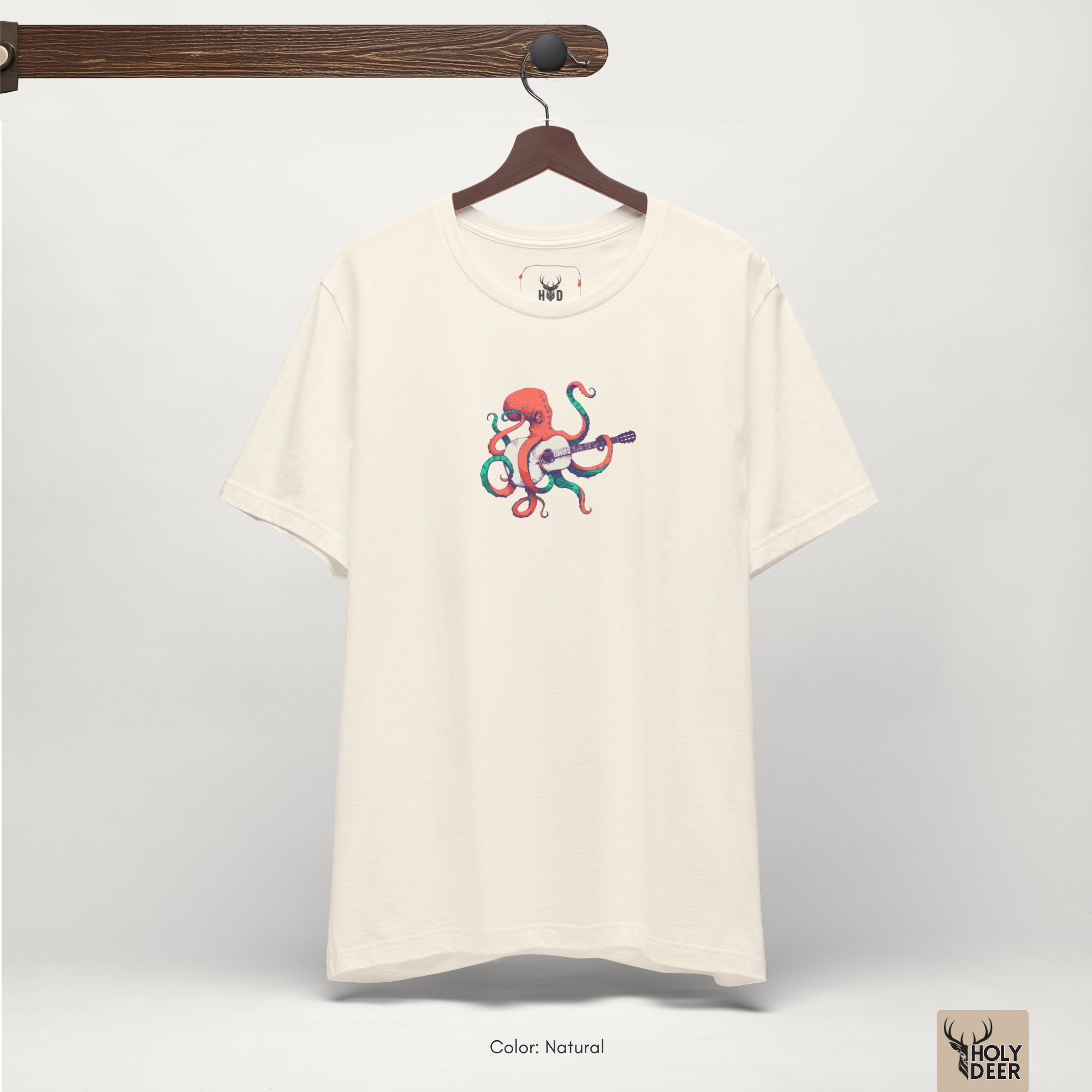 Moody high-contrast product edit of the Indie Musician Tee, maximizing the rich petrol blue canvas shadows and cementing Holydeer Clothing as the supreme design authority.
