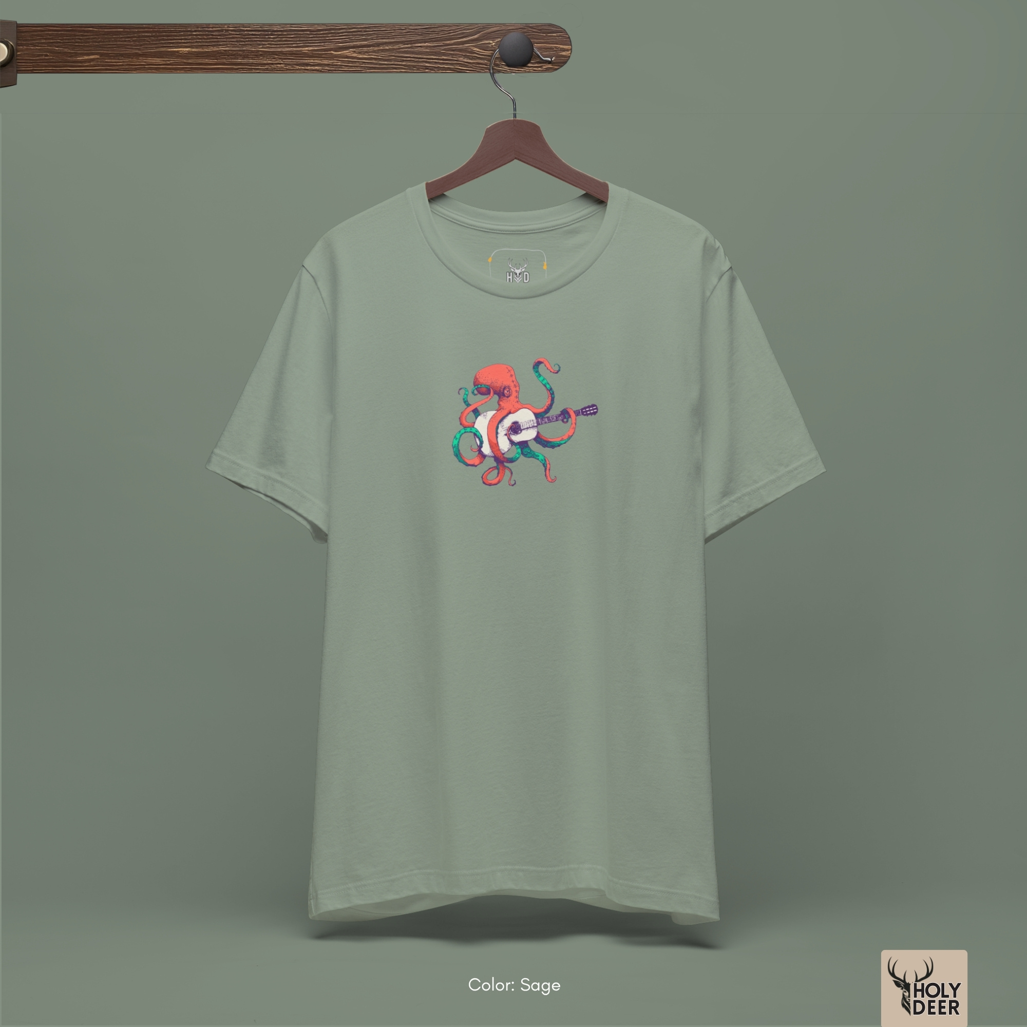 Cleanly folded presentation of the Indie Musician Tee, showing how the unique octopus guitarist layout forms an elite focal point for premium quirky streetwear capsule lines.