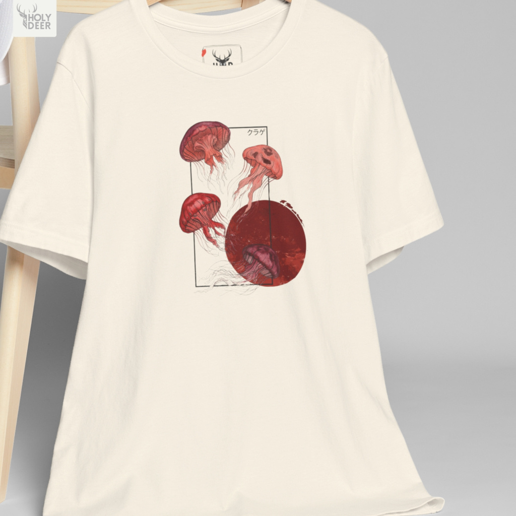 Professional flat lay photography of the Jellyfish T-Shirt by Holydeer Apparel, arranged cleanly next to vintage bamboo calligraphy brushes, traditional sumi ink blocks, and premium lifestyle aesthetic ocean top items.