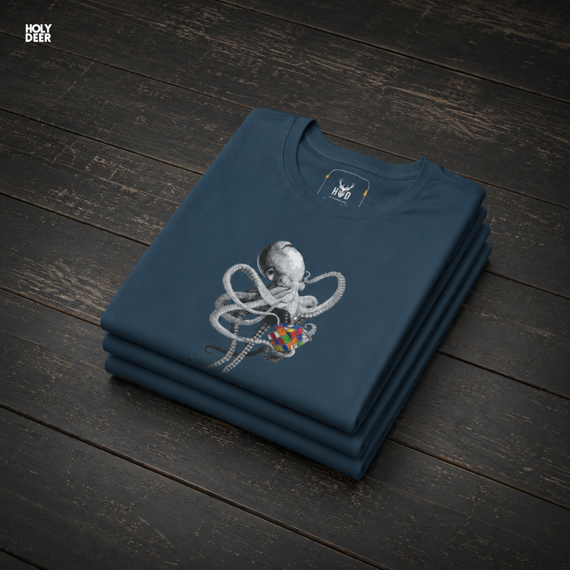 Macro view of the Smart Octopus Shirt print showcasing intricate ink shading on the curved tentacles, finely dotted gravure suckers, and vivid contrasting rubik cube gift facets crafted exclusively by Holydeer Streetwear