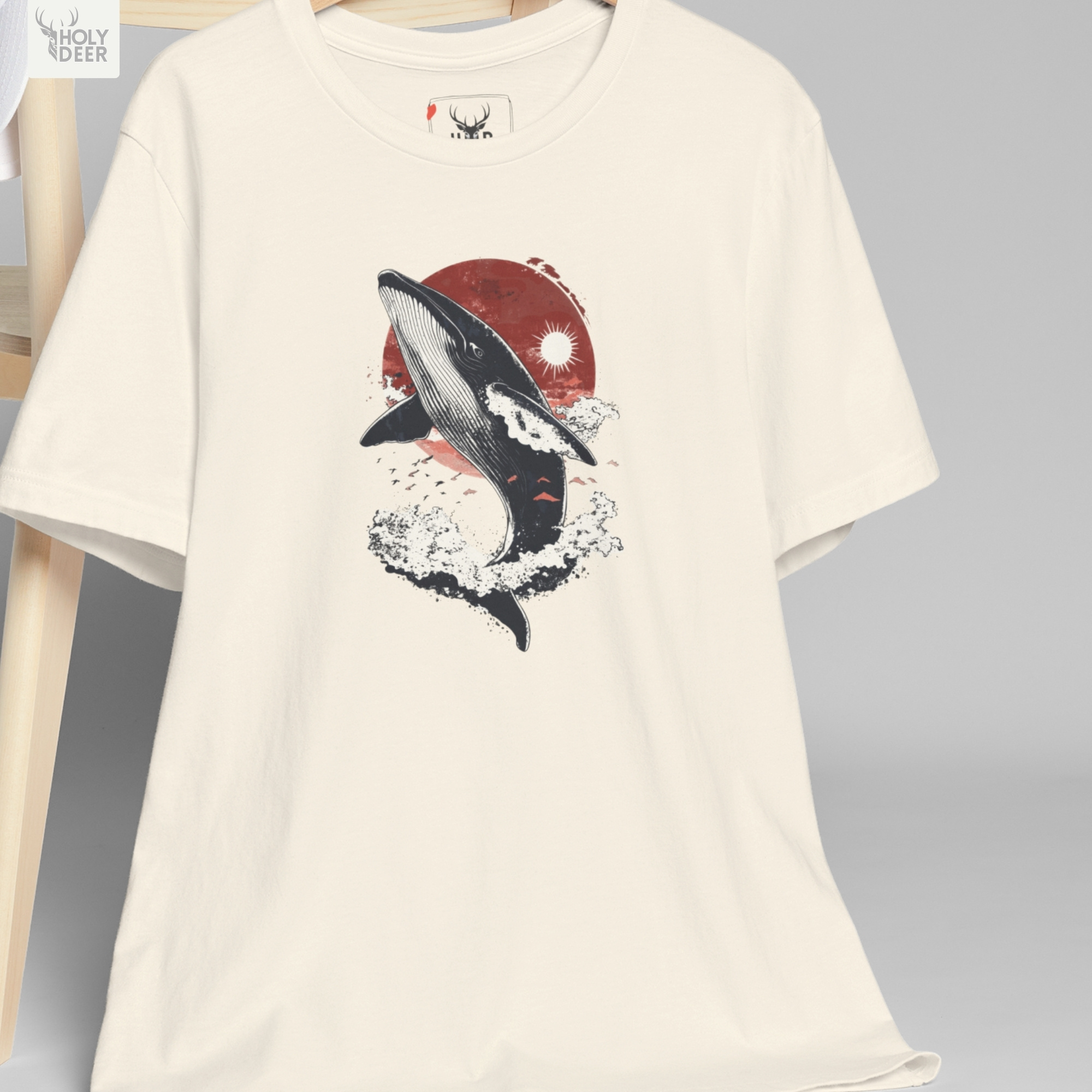 Minimalist dark backdrop focusing heavily on the standalone frame of the Kanagawa Wave Tee by Holydeer, proving it acts as a unique wearable art piece and an essential rising sun graphic collectible.