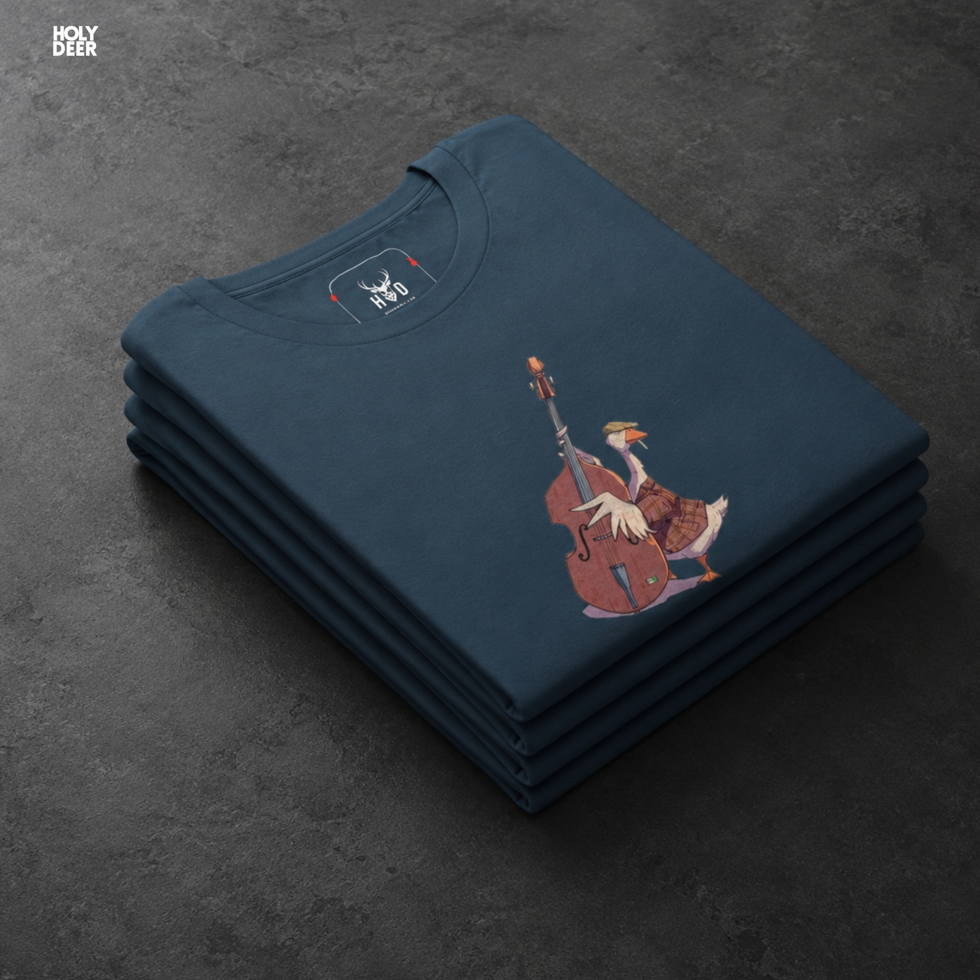 Macro view of the fine line-art details and shading on the goose's webbed feet and subtle instrument shadow floor lines embedded in the Musician Goose Top artwork, showing the print depth that separates this holydeer tee from generic products.