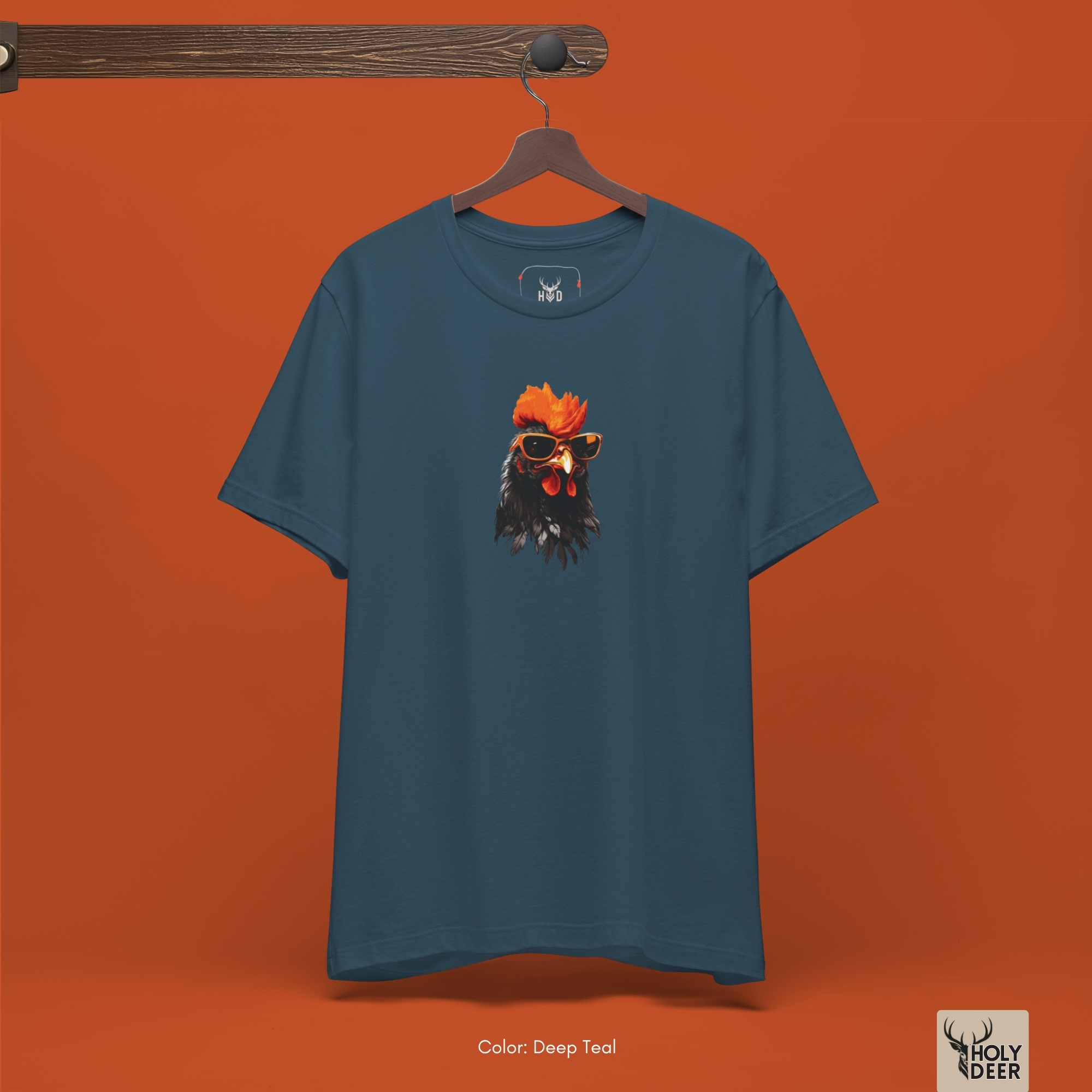 Crisp studio backdrop framing the unique Cool Rooster Tee by Holydeer Streetwear, magnifying the clean centered graphic placement and premium crazy chicken shirt presentation.