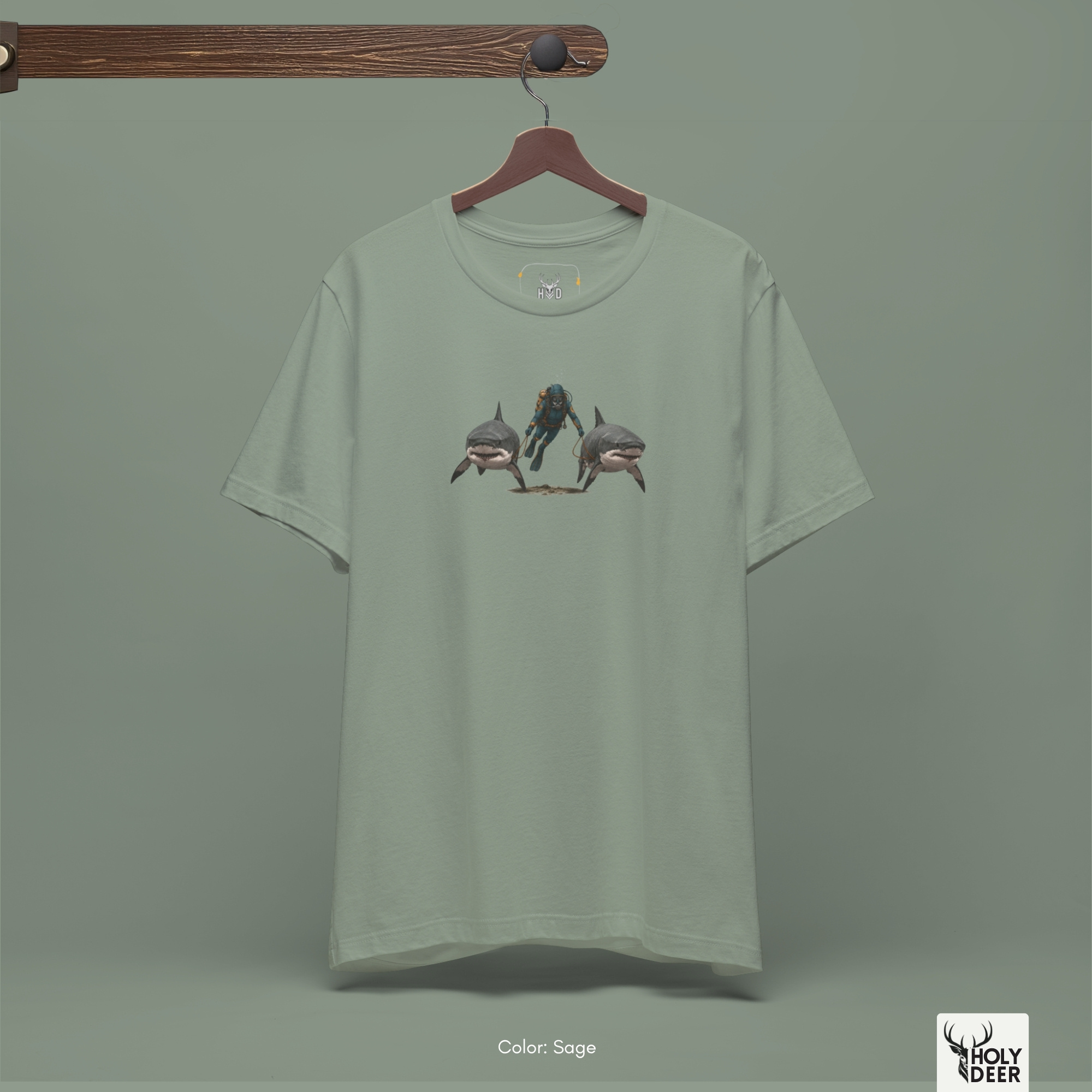 A close showroom catalog viewpoint of the Holydeer Apparel Shark Graphic Tee showing the specialized Sea Life Clothing printing finish. The framework tracks the tight screen registration of this Scuba Diving Shirt and Shark Lover Apparel selection to monitor deep design style rendering, material texturing behaviors, and light reflection.