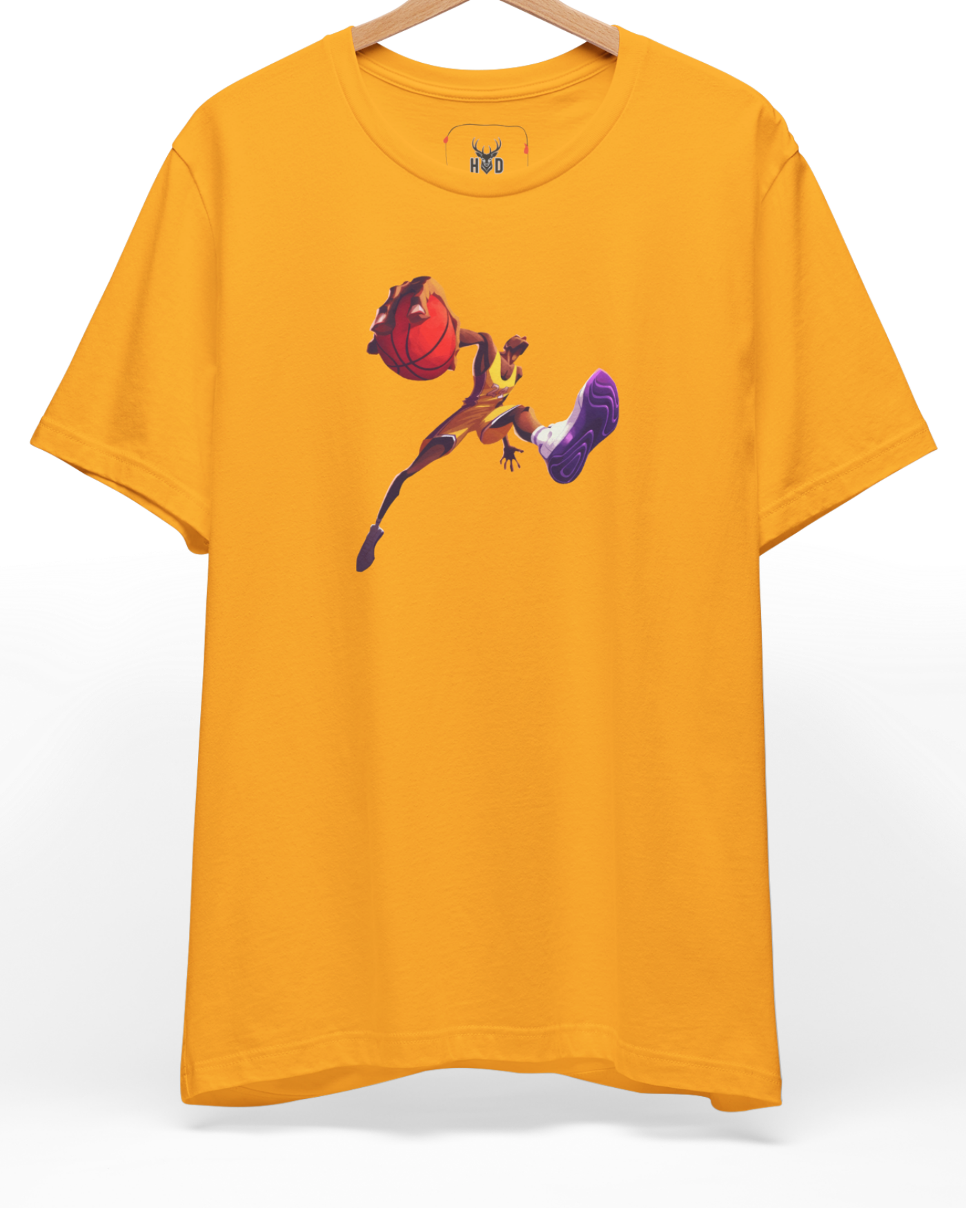 A studio-lit showcase of the official Holydeer Basketball Shirt suspended from a modern steel hanger assembly. The central Streetball Apparel print utilizes a radical fisheye lens perspective, magnifying the player's hand and red basketball as they launch into a gravity-defying dunk contest shirt pose on a clean gold background.