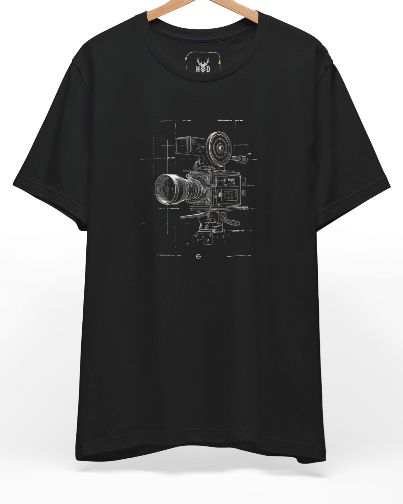 A high-end display of the official Holydeer Film Director Tee showcasing unique Boutique Studio Wear design lines. The central Filmmaker Gift Shirt graphic features a miniature Retro Cinema T layout centering a detailed Technical Camera Art camera blueprint top design with fine lens rings printed squarely on a black shirt canvas.