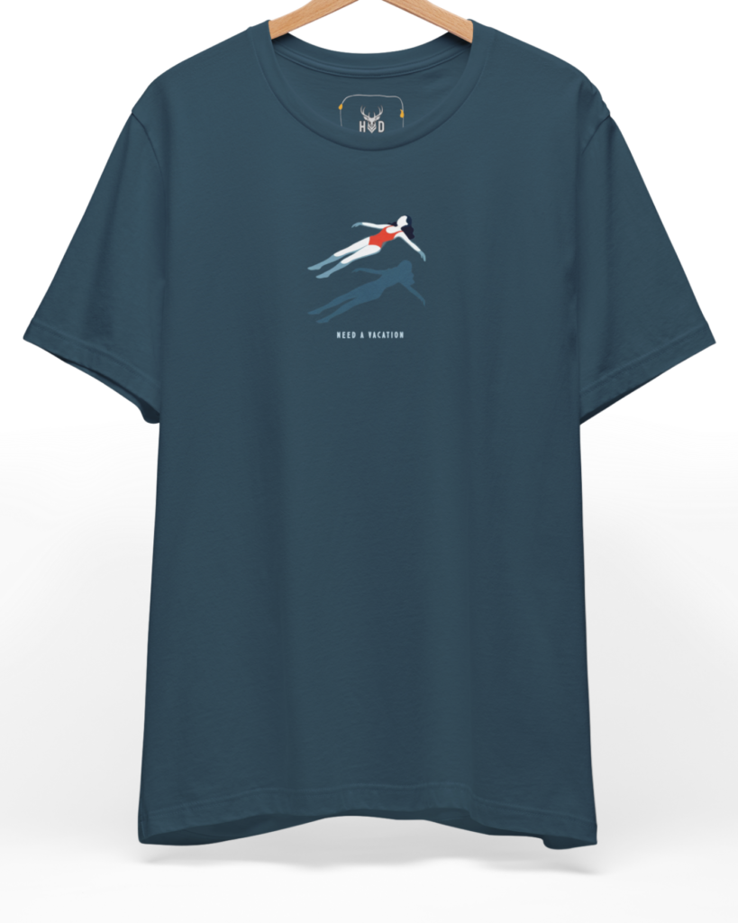 A high-end display of the official Holydeer Floating Girl Shirt showcasing unique Beach Life Apparel design lines. The central Need A Vacation Top graphic features a miniature Minimalist Swim Top layout centering a detailed surreal water shirt girl figure with a red swimsuit art posture casting a dark shadow printed squarely on a premium deep teal shirt canvas.