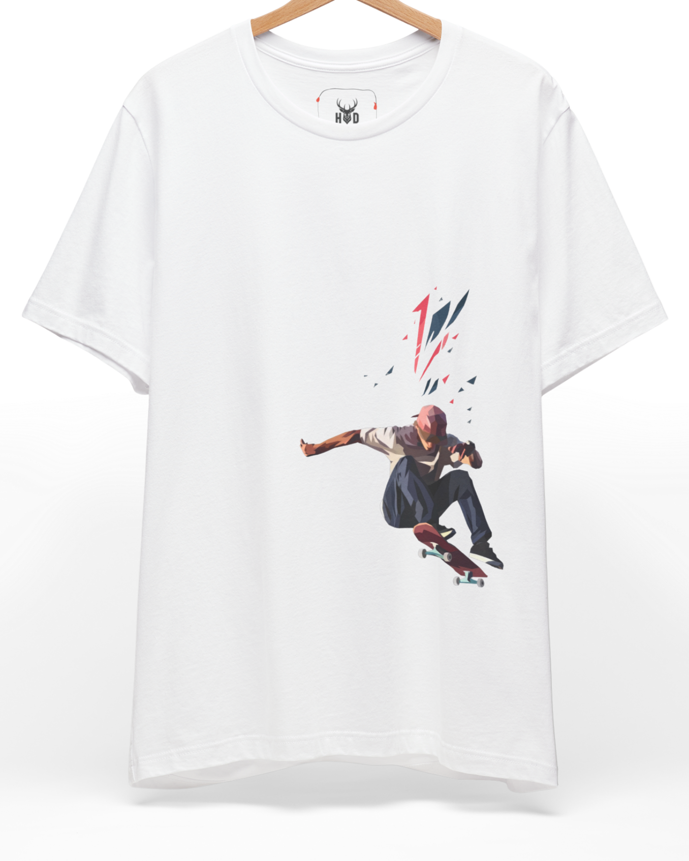 A high-end display of the official Holydeer Skateboarder Tee showcasing unique Urban Streetwear T design lines. The central Skater Gift Shirt graphic features a miniature Minimalist Skate T layout centering a detailed Low Poly Design skater figure executing an extreme sports t move with floating geometric fragments printed squarely on a white shirt canvas.