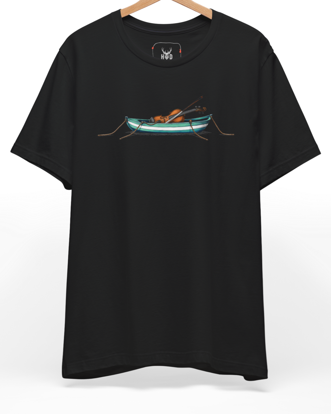A high-end showcase of our minimalist music top on a non-reflective dark garment frame. The artwork centers a miniature poetic music cloth concept tracking a polished brown classic violin body with its bow casually leaning over a striped turquoise and white rowing boat anchored safely in calm water.
