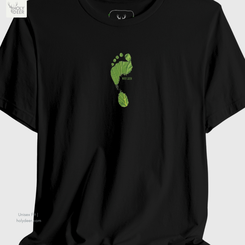 A close showroom catalog viewpoint of the Holydeer Apparel Walk Green Tee showing the specialized Boutique Activewear printing finish. The framework tracks the tight screen registration of this Sustainability Top and Organic Vibe Apparel selection to monitor deep design style rendering, material texturing behaviors, and light reflection.