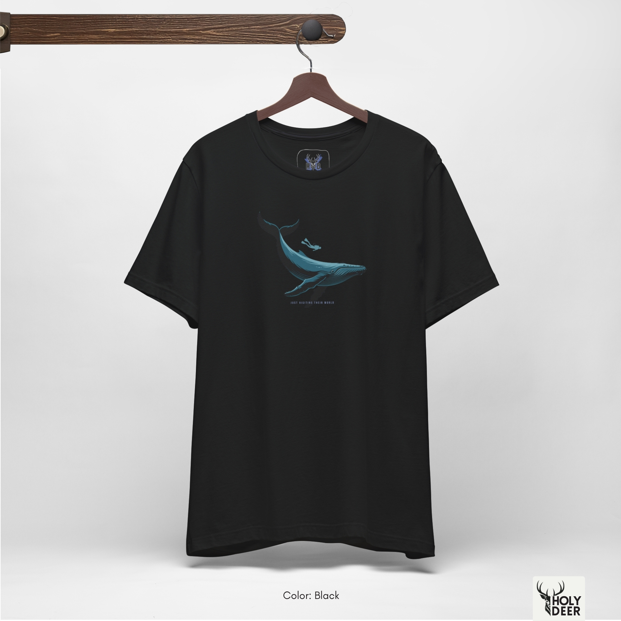 A close showroom catalog viewpoint focusing on the detailed print finish of the Holydeer Apparel Scuba Diving Whale Shirt. The camera positions across the chest panel to evaluate the deep design style rendering and clean fabric alignment, showing how our nautical streetwear garments maintain premium ink integration.