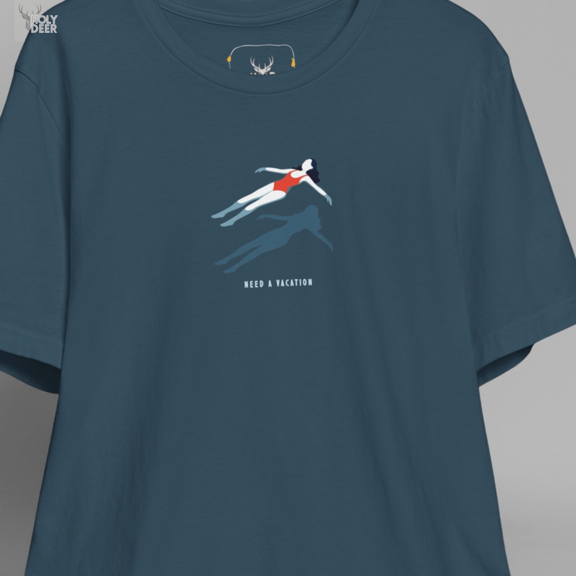 A close showroom catalog viewpoint of the Holydeer Apparel Floating Girl Shirt showing the specialized Boutique Summer Tee printing finish. The framework tracks the tight screen registration of this Summer Vacation Tee and Chill Aesthetic Top selection to monitor print density, material texturing behaviors, and light reflection.