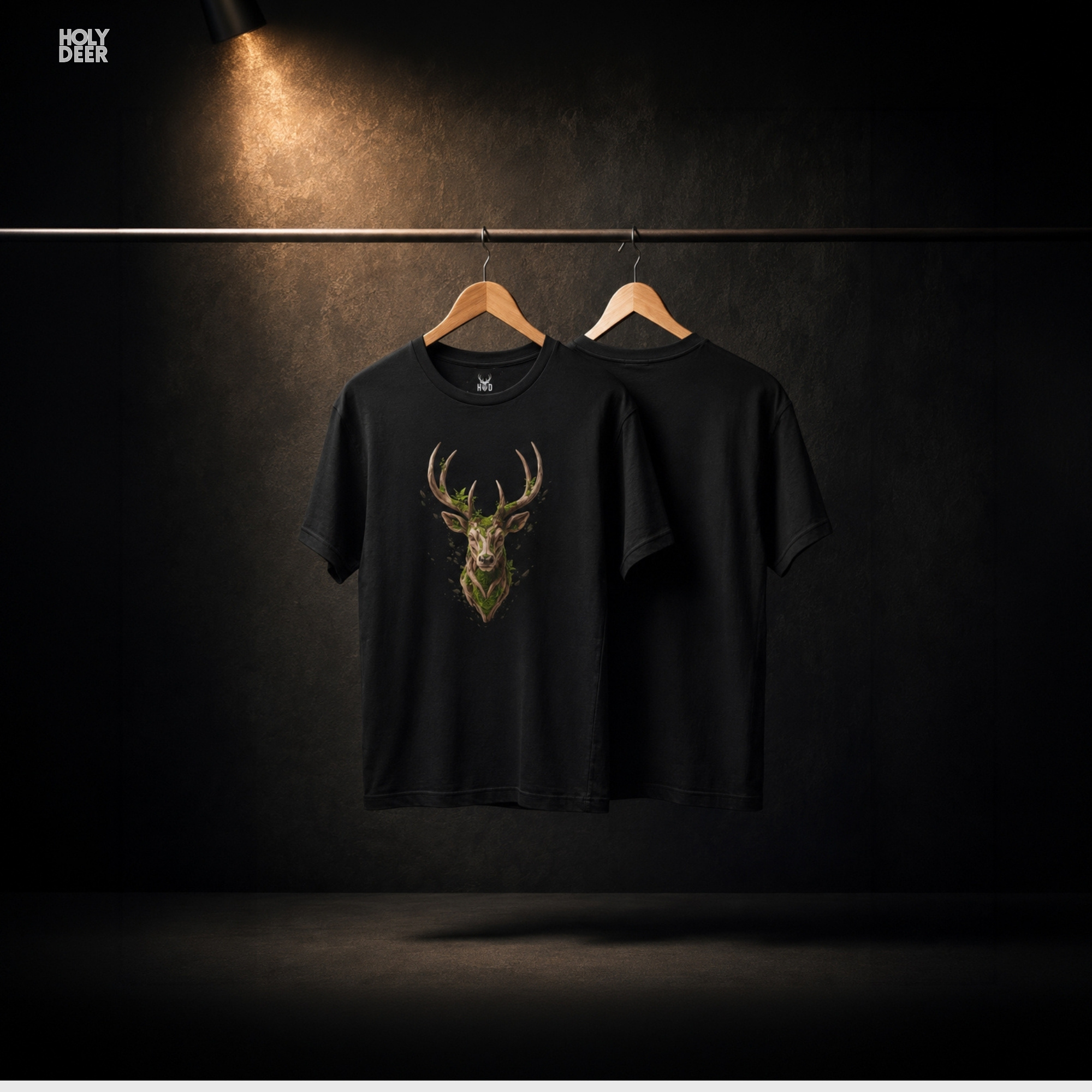 An extreme high-magnification macro focus inside the Holydeer Streetwear Deer Graphic Tee tracking the detailed Dark Academia Shirt horn matrix. The print layer highlights the sharp branch-like bone ridges, nested green moss tufts, small leafy vine extensions, and clean ink borders that define this premium majestic stag shirt piece.