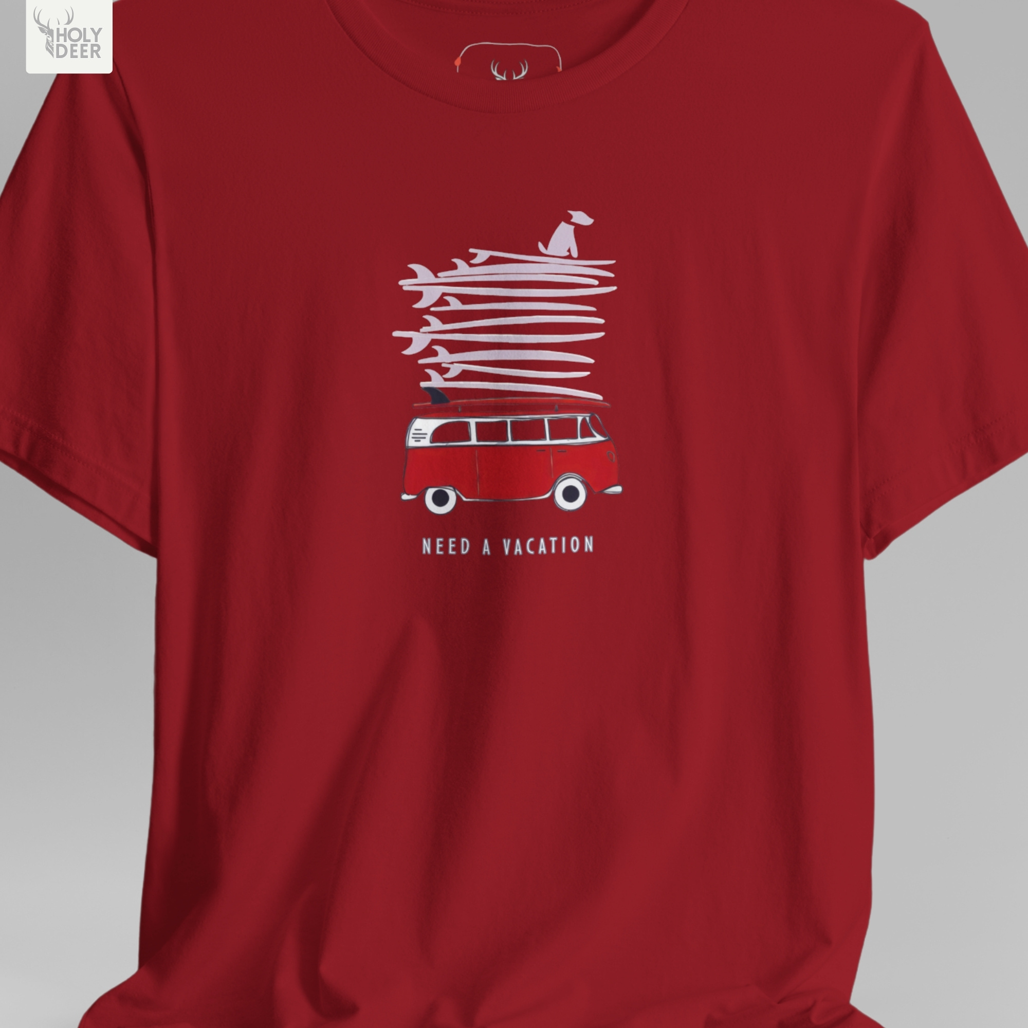 A detailed macro inspection of the Holydeer Clothing Vacation Graphic Tee focusing entirely on the towering surfboard pile pattern. This specific section tracks the multiple horizontal board fins, overlapping outline sketches, and desaturated charcoal ink saturation forming the central funny surfer shirt symbol.