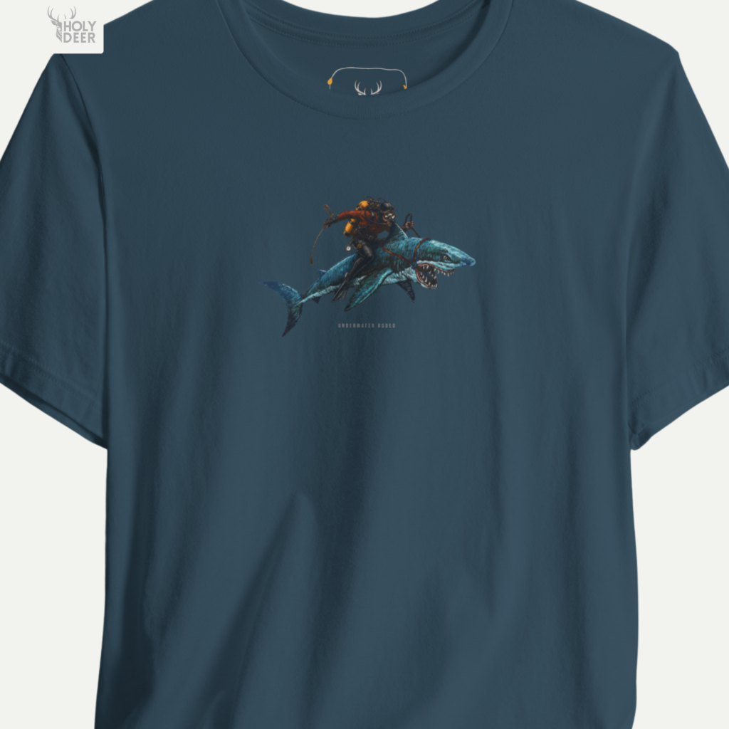 A close showroom catalog viewpoint of the Holydeer Apparel Shark Graphic Tee showing the specialized Sea Life Clothing printing finish. The framework tracks the tight screen registration of this Scuba Diving Shirt and Shark Lover Apparel selection to monitor deep design style rendering, material texturing behaviors, and light reflection.