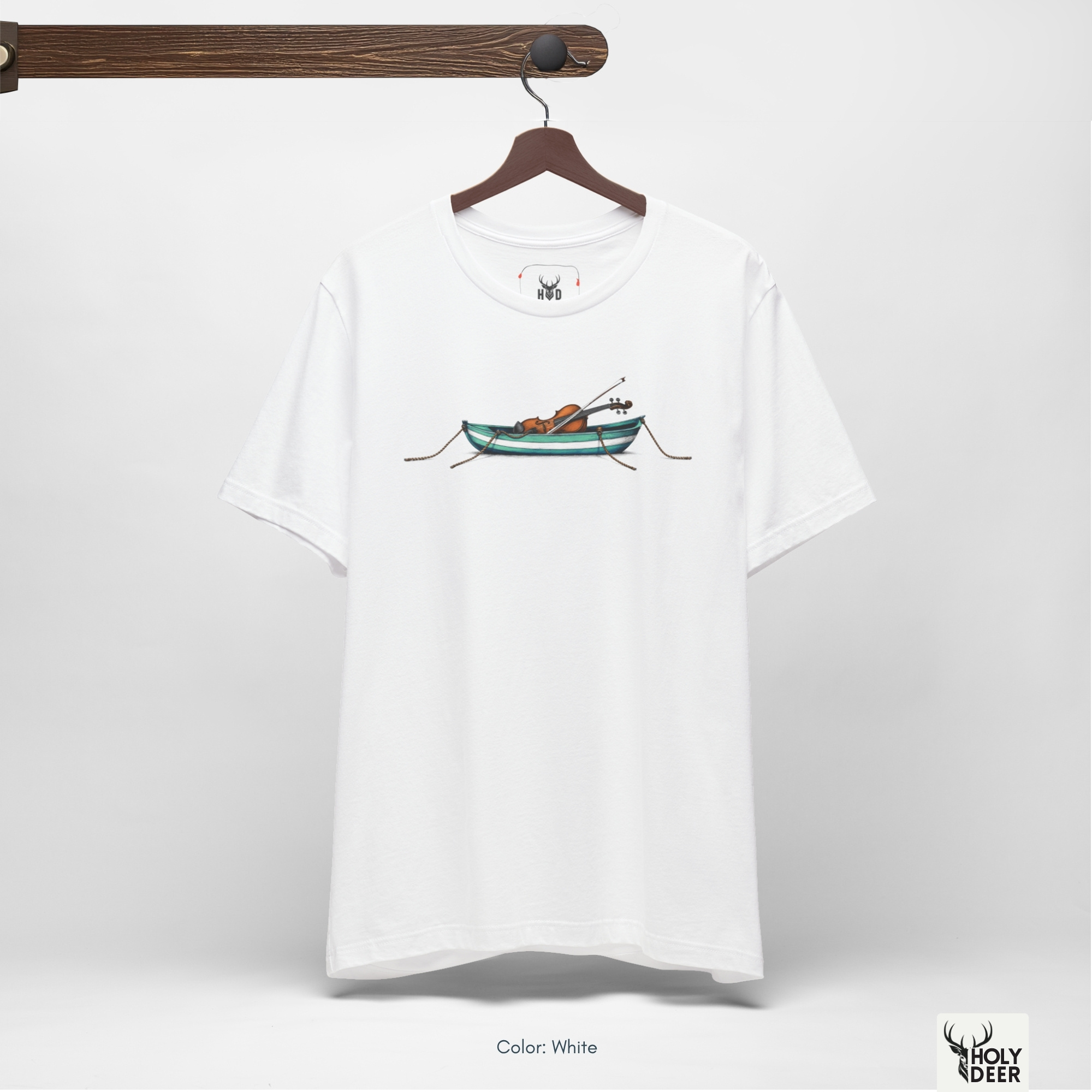 An abstract moody editorial lookbook grid layout demonstrating intense side spotlight shadow blocks across the deep fabric wrinkles of the poetic music cloth shirt. The harsh dark contrast treatment proves that the centered miniature boat graphic maintains strong visual pop.
