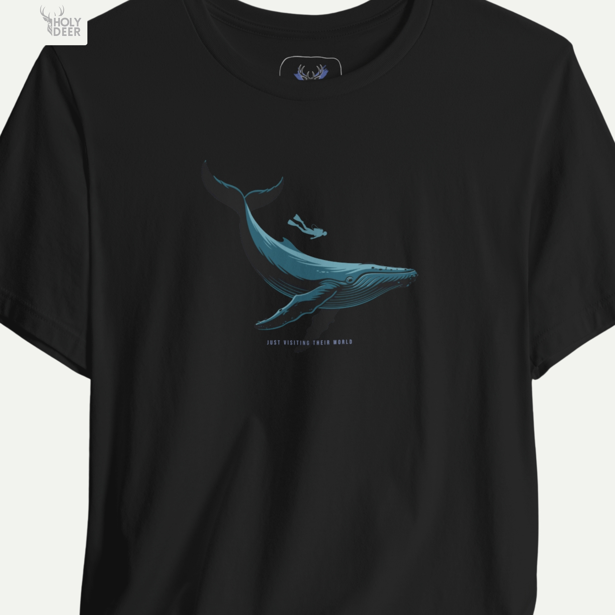 This detailed macro angle monitors the lowercase environmental message printed below the marine art on the Holydeer Tee Scuba Diving Whale Shirt. The technical frame checks the alignment of each individual text character to guarantee absolute layout cohesion across this premium diver gift shirt run.