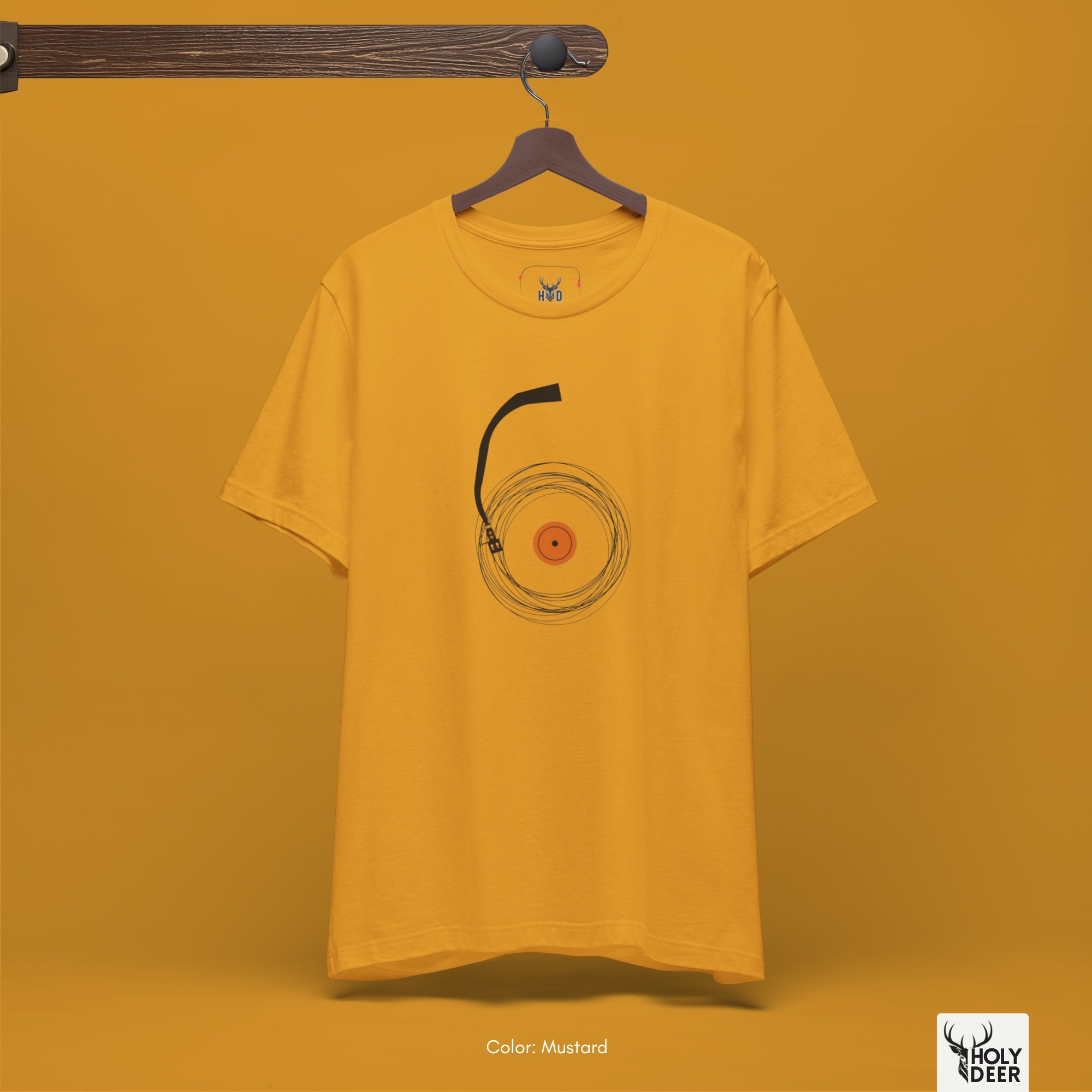 Technical side perspective tracking the parallel thread runs along the arm junction seam and sleeve fold of the unisex graphic dj tshirt.