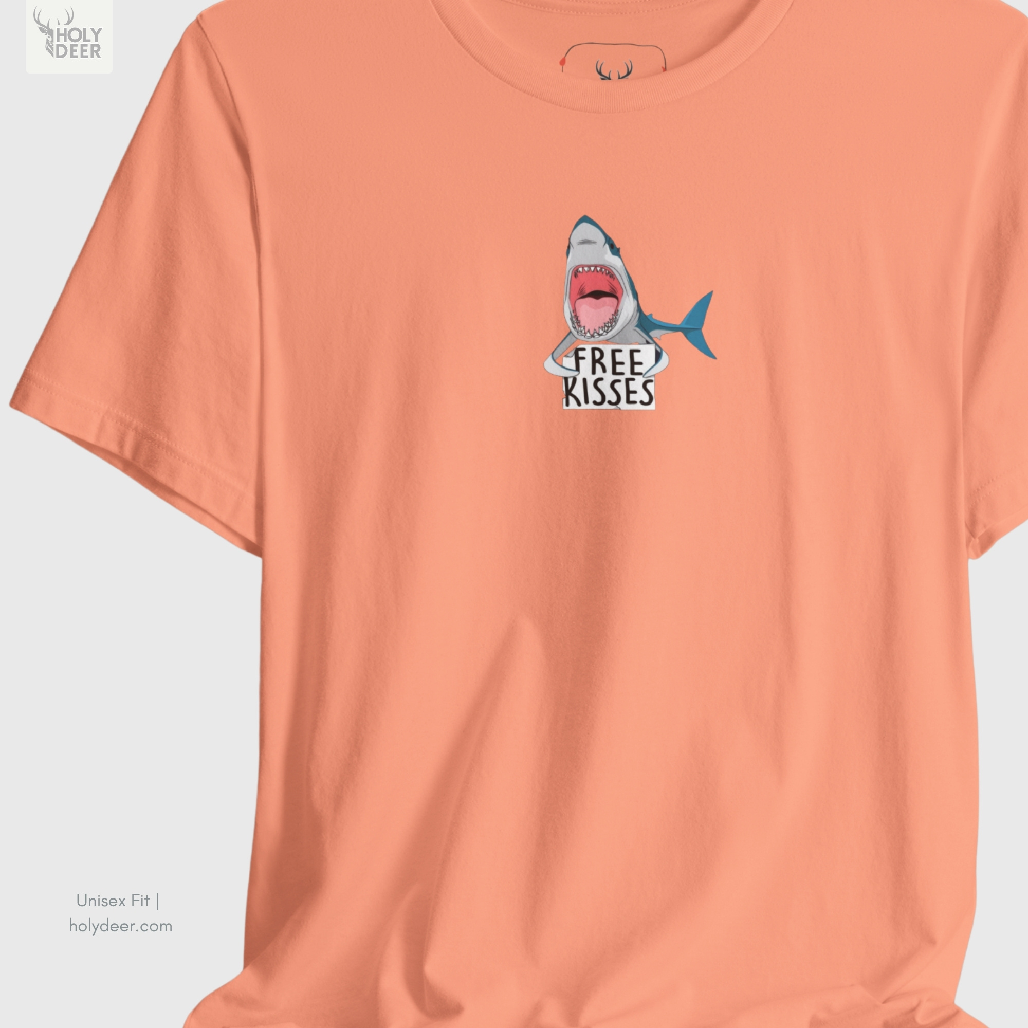 An extreme high-magnification macro focus inside the Holydeer Streetwear Shark Graphic Tee tracking the detailed Funny Shark Shirt open maw matrix. The print layer highlights the bright pink mouth shading tones, rows of sharp white pointed teeth, curved blue nose contours, and clean ink borders that define this premium free kiss piece.