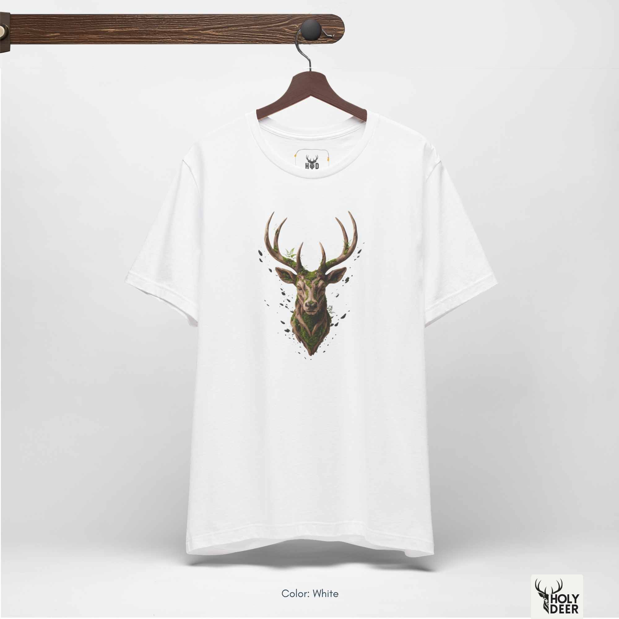An abstract moody editorial lookbook grid manipulating deep fabric wrinkles and harsh side spotlight shadows on the Holydeer Streetwear Deer Graphic Tee. This high-contrast witchy forest top and majestic stag shirt treatment demonstrates how the central brown and green mystic forest shirt print maintains striking visual pop.