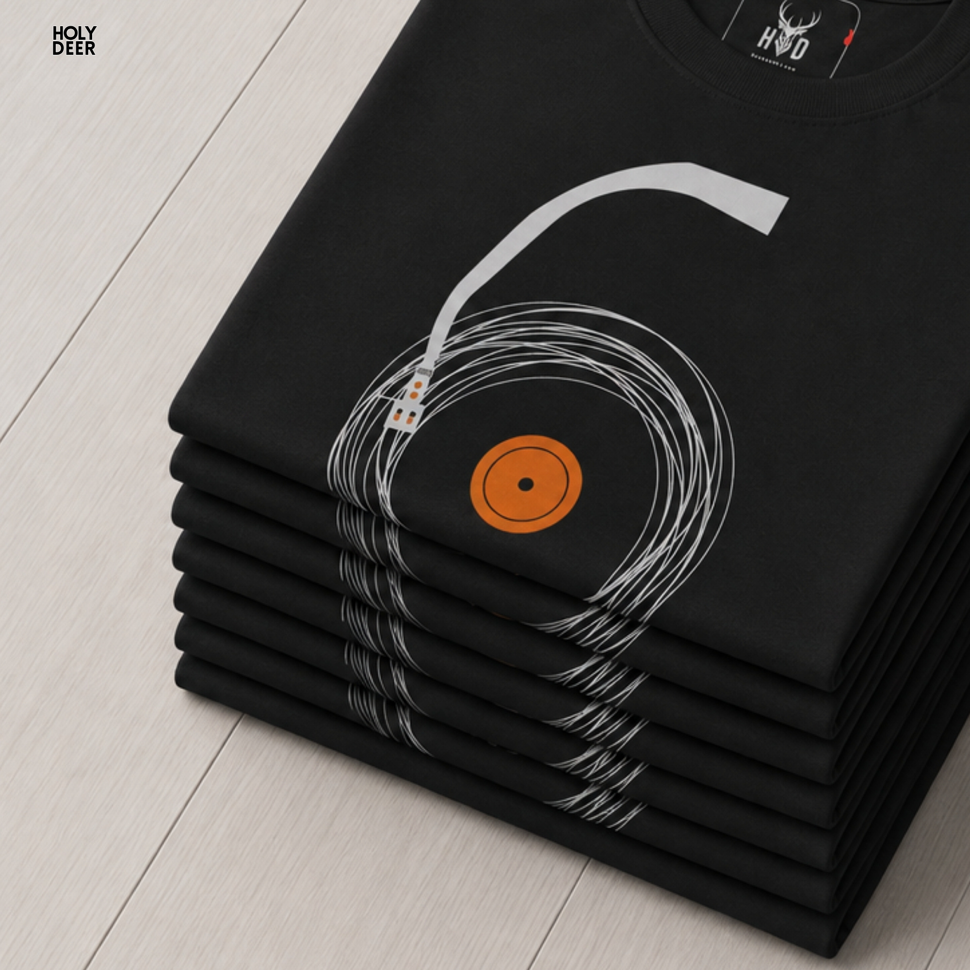 High-magnification print detail tracking the smooth orange ink fill concentric rings and the fine dark central pinpoint forming the core of the vintage vinyl art.