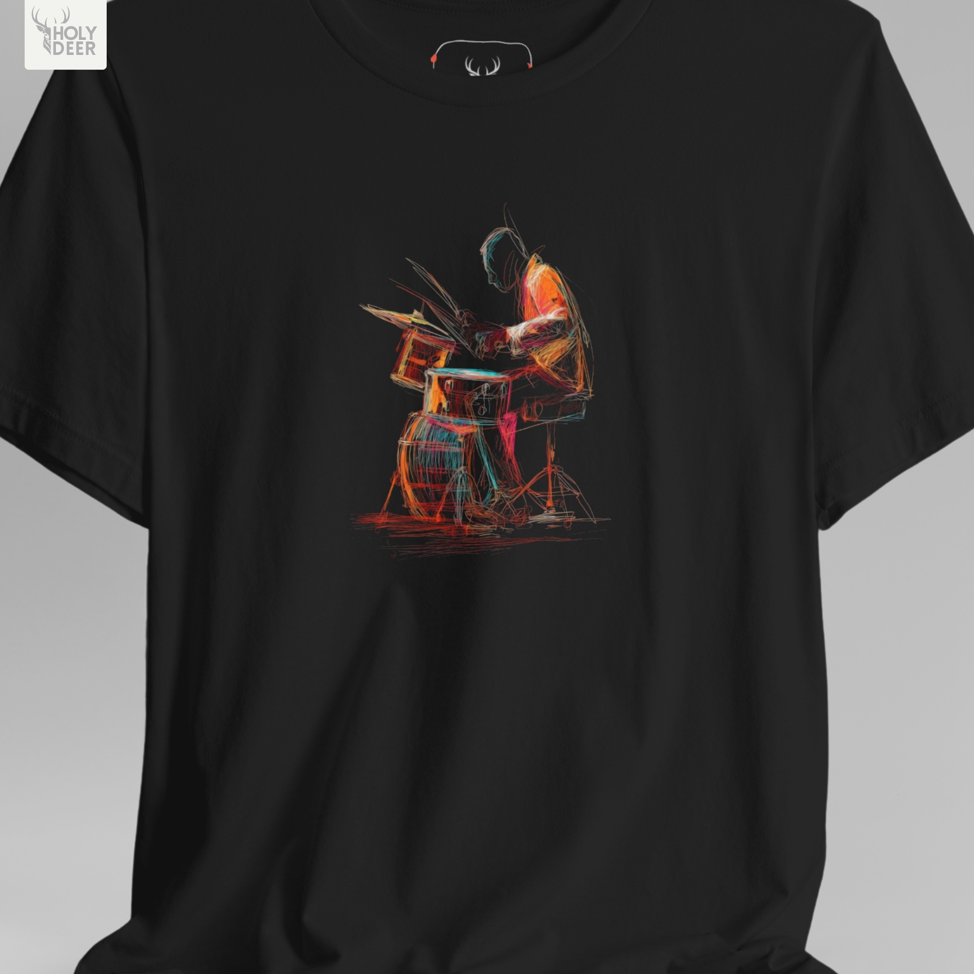 An extreme high-magnification macro focus inside the Holydeer Streetwear Drummer Graphic Tee tracking the detailed Neon Musician Top performer vector. The print layer highlights the bright orange hoodie fills, overlapping sketchy arm lines, rapid drum stick motions, and clean ink borders that define this premium music lover shirt piece.