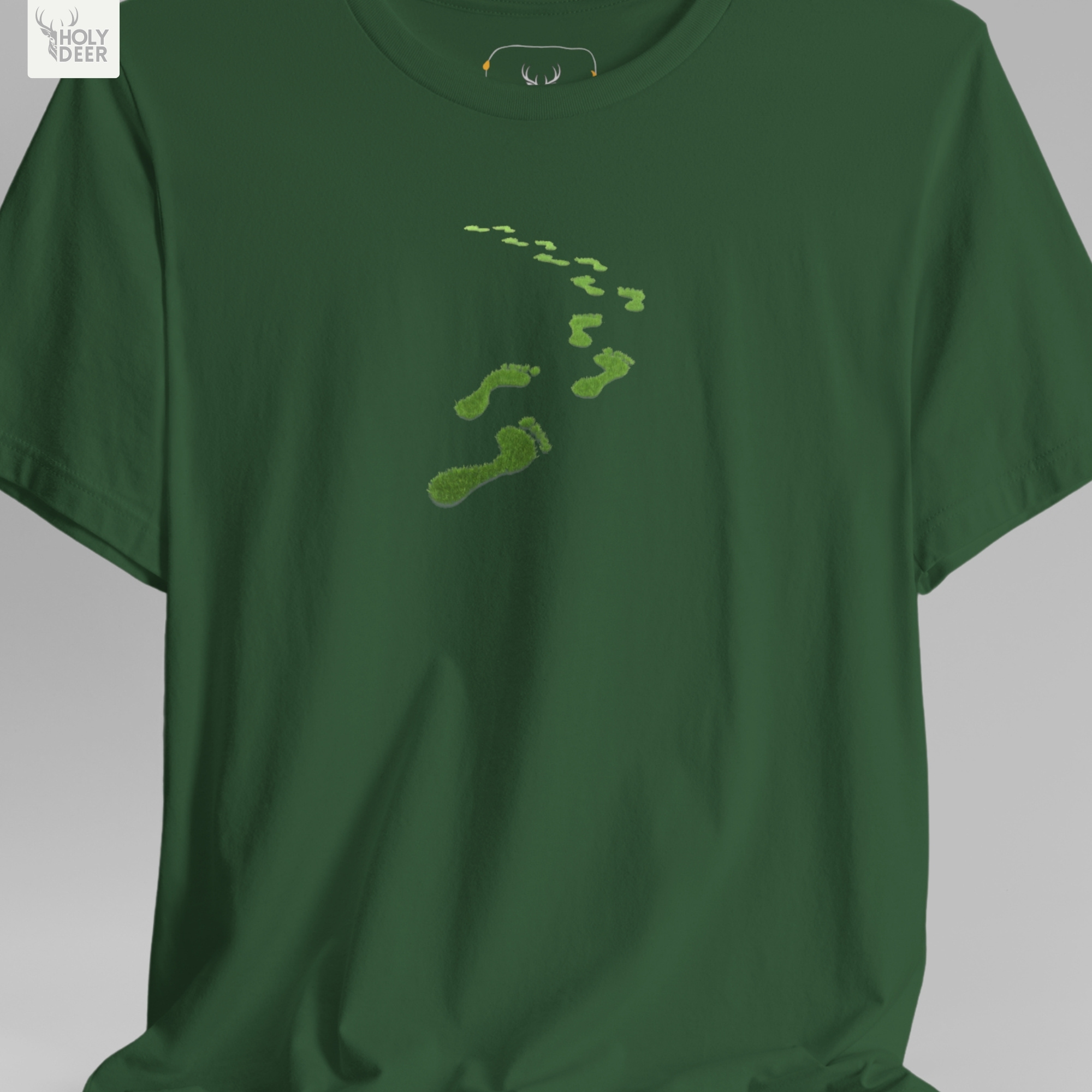 An extreme high-magnification macro focus inside the Holydeer Streetwear Green Steps Shirt tracking the detailed Sustainability Shirt path matrix. The print layer highlights the sharp branch-like organic ridges, nested green plant fibers, small leafy foliage extensions, and clean ink borders that define this premium conscious path top piece.